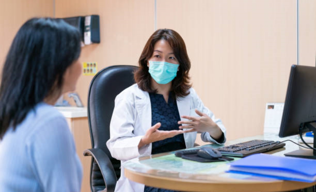 Doctor talking to a patient