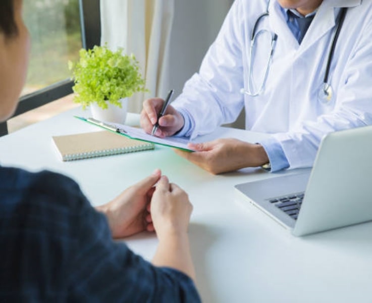 Doctor talking to a patient