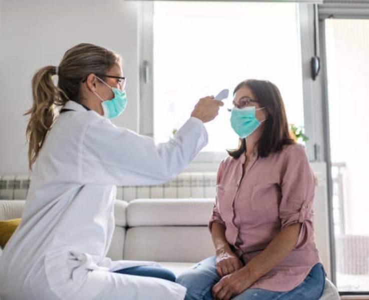 Doctor examining a patient