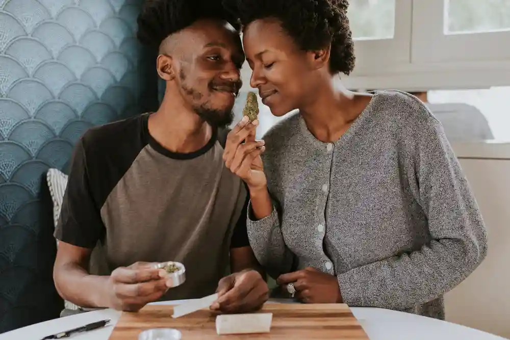 Black Couple Enjoying Sushi and Marijuana