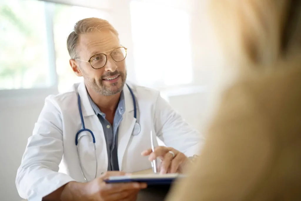 Doctor talking to patient